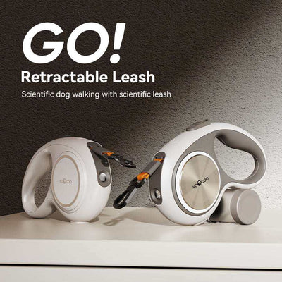 GO! PRO Retractable Leash with ergonomic handle and integrated flashlight for safe dog walking.